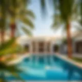 Luxurious villa with private pool surrounded by palm trees