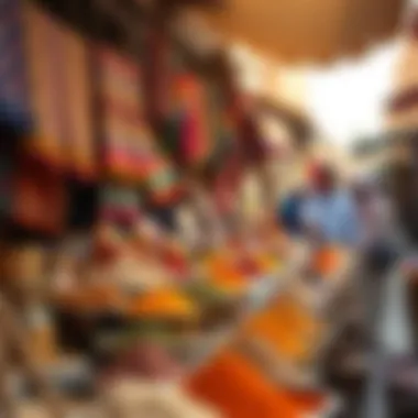 Bustling traditional market in Al Ras featuring vibrant textiles and spices